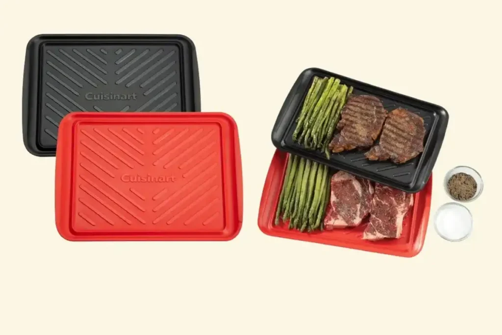 Cuisinart BBQ grill tray holding grilled vegetables and meats on an outdoor grill