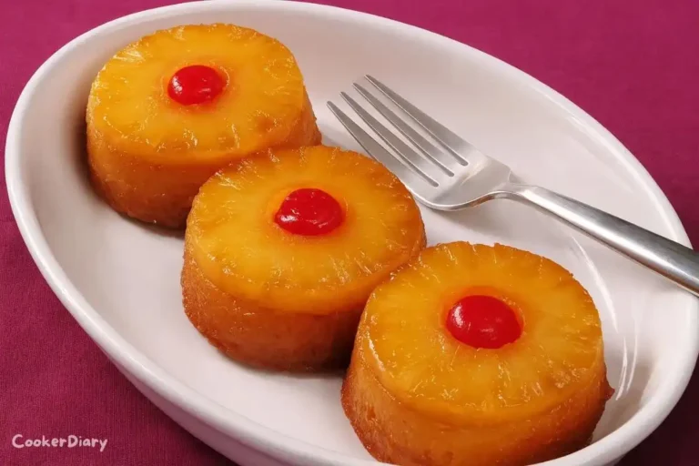 Mini pineapple upside down cakes topped with caramelized pineapple rings and cherries