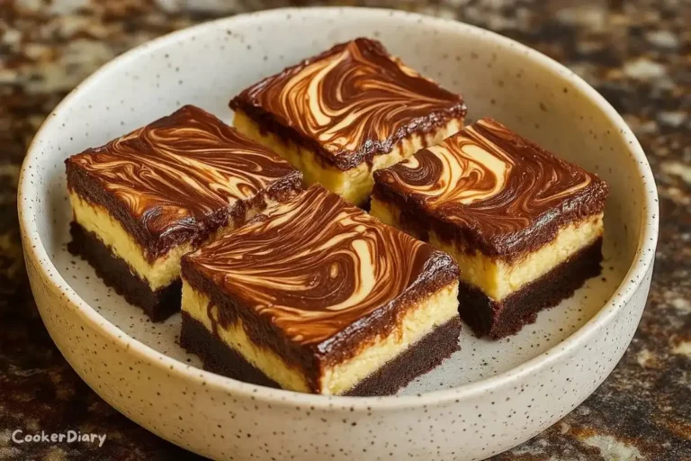 Nutella cheesecake bars with creamy chocolate filling and a biscuit crust, cut into squares on a plate