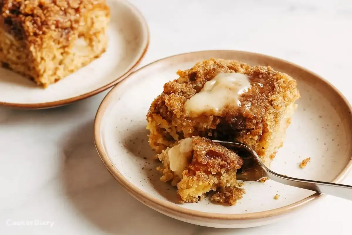 Slice of cinnamon sugar apple cake served on a dish