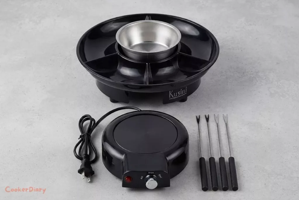 Full Kusini fondue set including base, bowl, tray, and forks